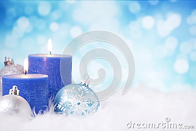 Blue and silver Christmas scene with baubles and candles Stock Photo