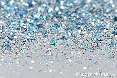 Blue and Silver Frozen Snow Winter Sparkling Stars Glitter background. Holiday, Christmas, New Year abstract texture Stock Photo