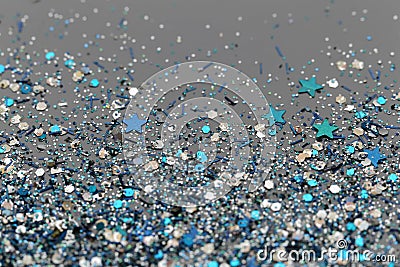 Blue and Silver Frozen Snow Winter Sparkling Stars Glitter background. Holiday, Christmas, New Year abstract texture Stock Photo