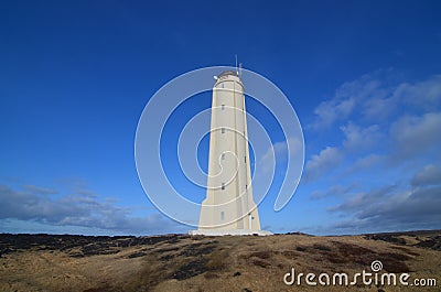 Blue Skies and Golden Fields Surround Malarrif Lighthouse Stock Photo