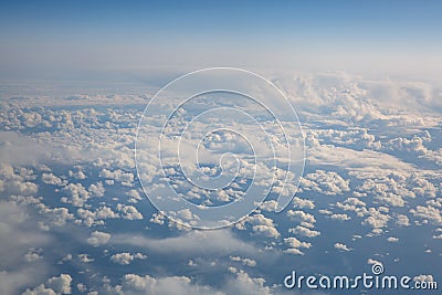 Blue sky from airplane. View above the clouds Stock Photo