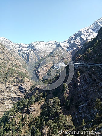 Blue sky & All way Mountain & valleys near katra , Jammu & Kashmir, India covered with snow at peak Stock Photo