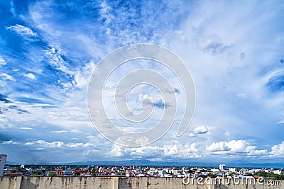 Blue sky background with tiny clouds and cityscape Stock Photo