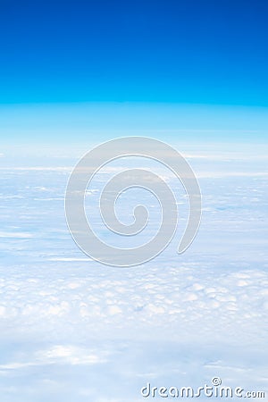 Blue sky and Cloud Top view from airplane window, Nature backgrou Stock Photo