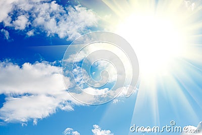 Blue sky with clouds and sun with rays of light Stock Photo