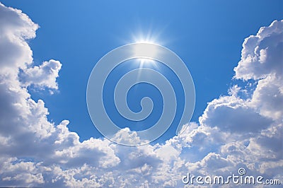 Blue sky with clouds and sun reflection.The sun shines bright in Stock Photo