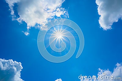 Blue sky with clouds and sun reflection.The sun shines bright in the daytime in summer Stock Photo