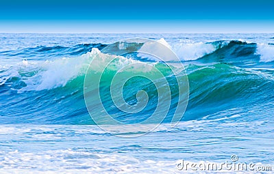 Blue Sky And Costal Waves Stock Photo