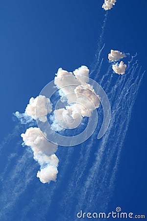 Blue sky with fireworks firecrackers white clouds Stock Photo