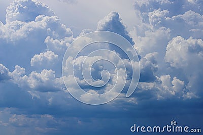Blue sky with lowering clouds as a background Stock Photo