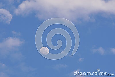 Blue sky with the moon and clouds Stock Photo