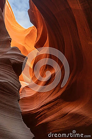 Blue sky with orange sandstone cliff of lower antelope slot canyon in Arizona Stock Photo