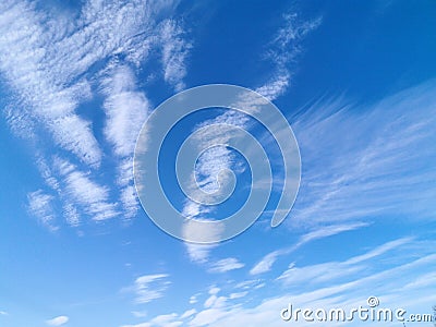 Blue sky with spindrift clouds Stock Photo