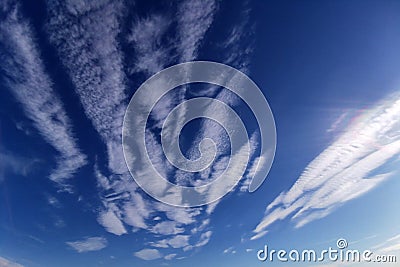 Blue sky with spindrift clouds Stock Photo