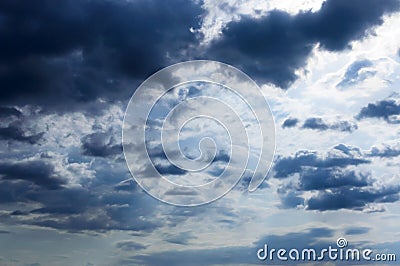 A blue sky with storm clouds. Stock Photo