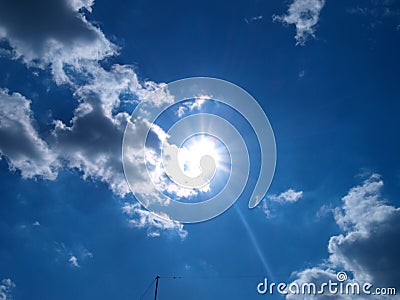 Sun illuminates the clouds. Stock Photo