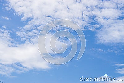 Blue sky with tiny clouds Stock Photo