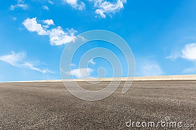 Blue sky white clouds and asphalt road Stock Photo