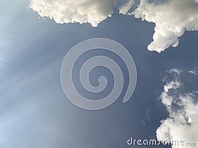 Blue sky with white clouds and sunlight Stock Photo