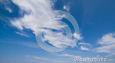 Blue sky with clouds. Sunny summer day Stock Photo