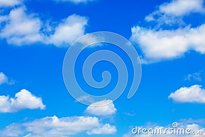 Blue sky with white fluffy clouds Stock Photo