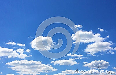 Blue sky and white puffy clouds Stock Photo