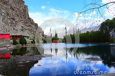 Blue sky wonderful reflec on water. This place so beautiful called natural lake in gilgit baltistan pakistan Stock Photo