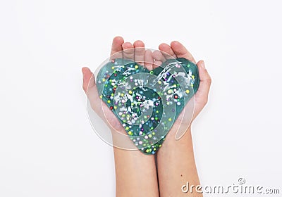 Blue slime in child hands. Stock Photo