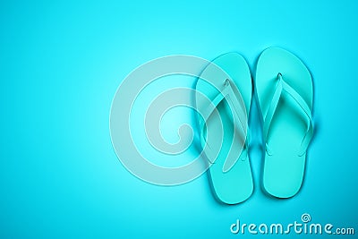 Blue slippers on empty background Stock Photo