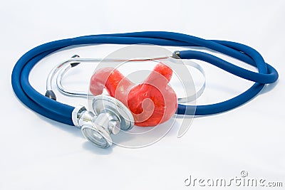 Blue stethoscope encircles stomach shape on white background. Idea of photo diagnosis, prevention and treatment of diseases of sto Stock Photo