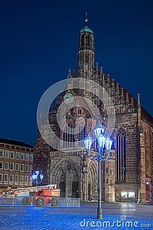 Blue street lights in front of the Frauenkirche in Nuremberg. The blue night 2023 Stock Photo