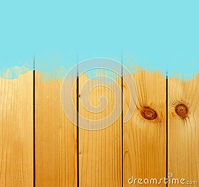 Blue stroke of paint brush on wooden background Stock Photo