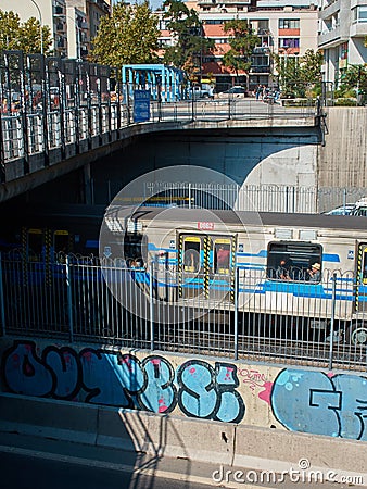 Blue Subway train with graffiti Editorial Stock Photo