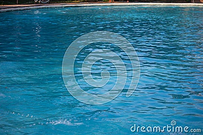 Blue swimming pool rippled water detail Stock Photo