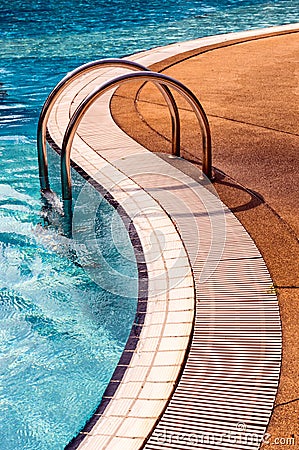 Blue swimming pool with steps Stock Photo