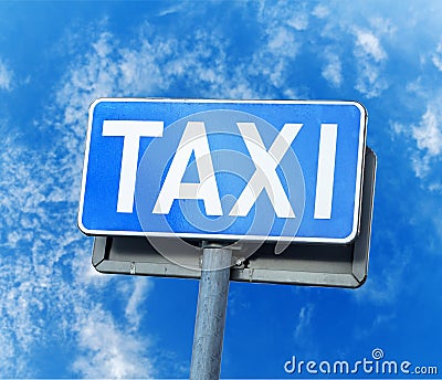 Blue taxi street sign isolated against blue sky Stock Photo