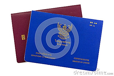 Blue Thai Work Permit book on electronic passport isolated on white background. Stock Photo