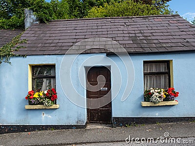 Blue Cottage in Cong Editorial Stock Photo