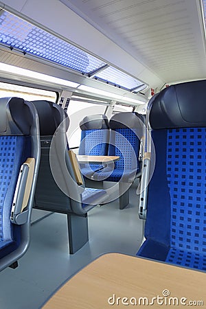 Blue train seats empty useful as travel concept Editorial Stock Photo