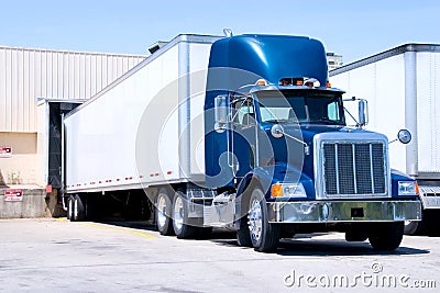 Blue Truck At Dock Stock Photo