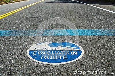 Tsunami evacuation route road sign on the asphalt, Highway 101, Oregon, USA. Stock Photo