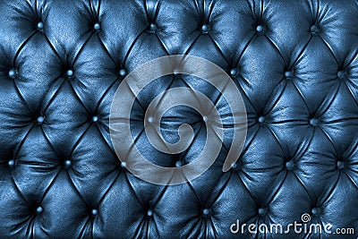 Blue tuffted leather with buttons Stock Photo