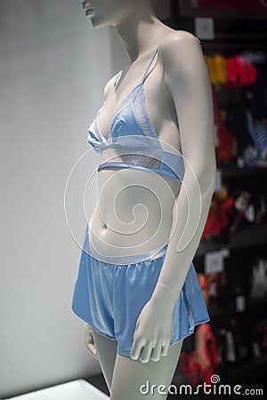 blue underwear on mannequin in fashion store showroom for women Stock Photo