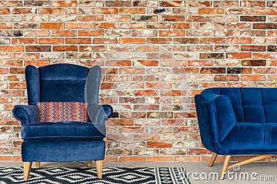 Blue upholstered armchair Stock Photo