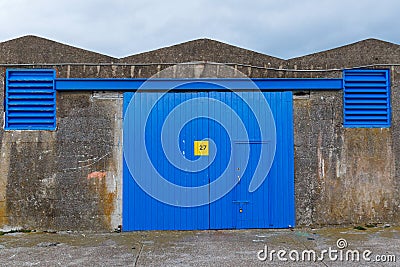 Blue warehouse door Stock Photo