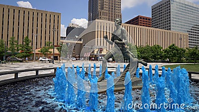 Blue water fountain with Runner Statue at Kiener Plaza Park in St. Louis - ST. LOUIS, UNITED STATES - JUNE 19, 2019 Editorial Stock Photo