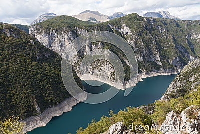 Blue water of Piva lake Stock Photo