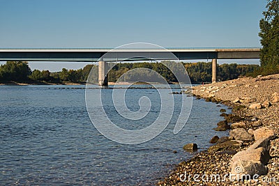 Blue water and a rocky shore Stock Photo