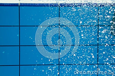 Blue water swimming pool underwater Stock Photo