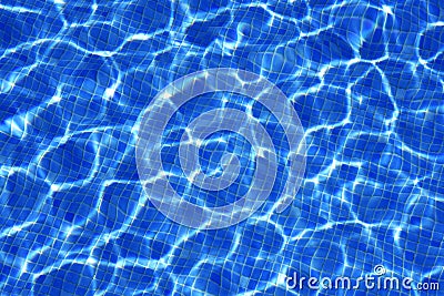 Blue water texture, tiles pool in sunny day Stock Photo